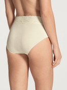 Women model is wearing Midi brief made of 100% Cotton in Beige, Lace from the Iconics series by CALIDA, Back view