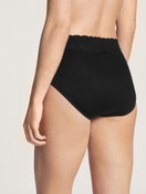 Women model is wearing Midi Briefs, 2-Pack made of 100% Cotton in Black, Unicoloured from the Iconics series by CALIDA, Back view