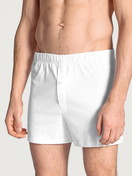 Le mannequin Homme porte le/la Boxer short avec ouverture en 100% coton de couleur Blanc, Unicolore, de la série Cotton Code de CALIDA, Vue de face
