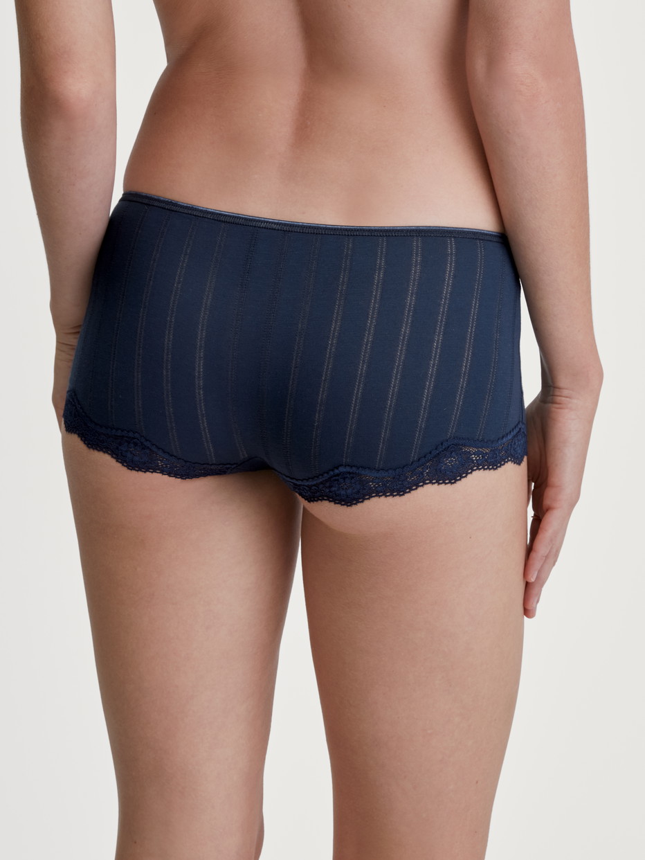 Women model is wearing Panty, low cut made of Cotton in Blue, Lace from the Etude Toujours series by CALIDA, Back view
