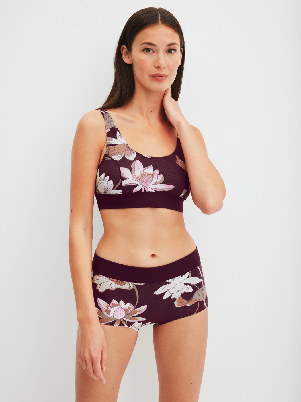 Women model is wearing Shorty regular cut made of Cotton in Red, Floral from the Elastic Trend Spec. series by CALIDA, Outfit