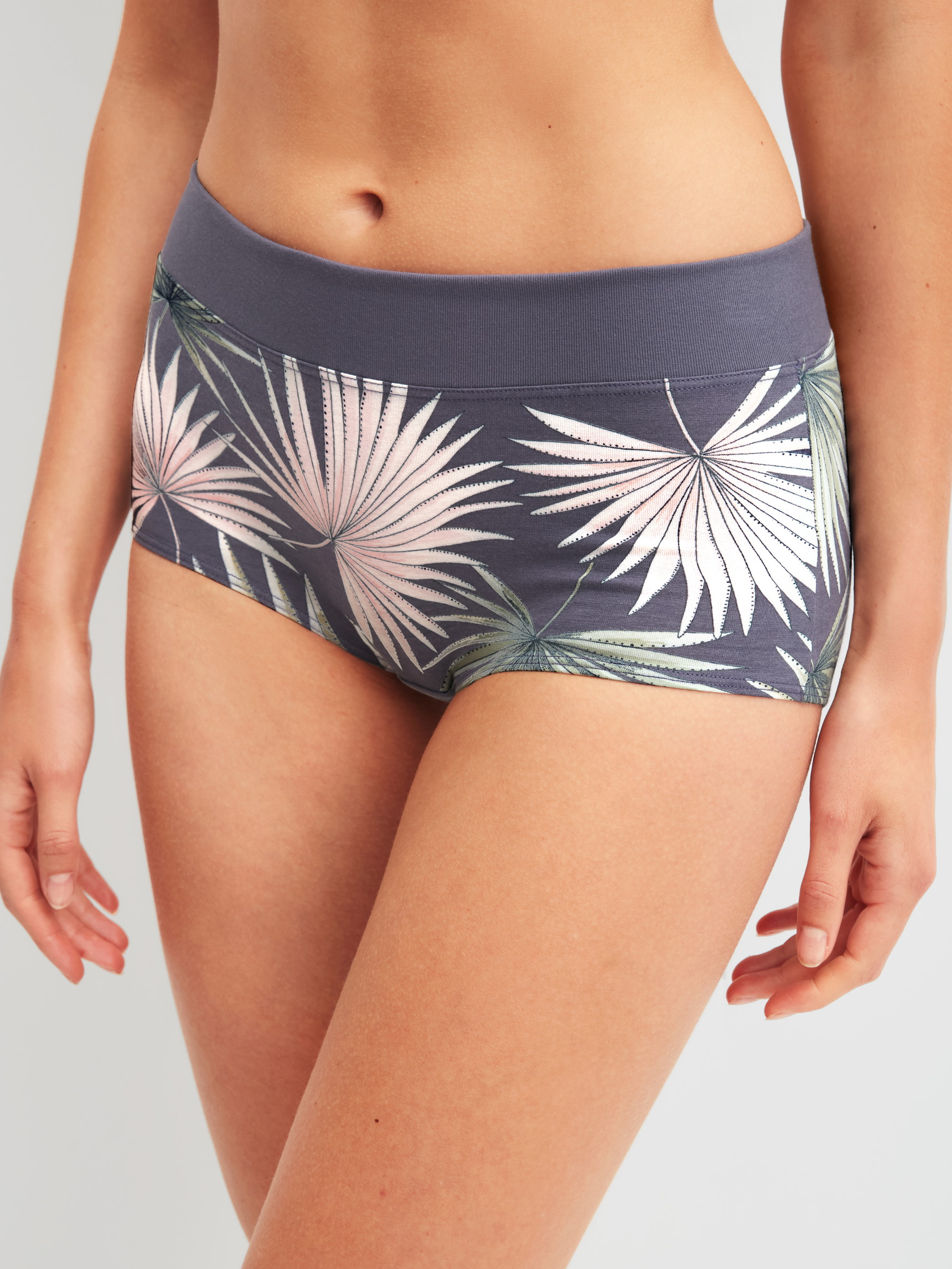 Women model is wearing Shorty regular cut made of Cotton in Grey, Floral from the Elastic Trend series by CALIDA, Front view