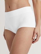 Women model is wearing Shorty regular cut made of Cotton in White, Unicoloured from the Elastic Special series by CALIDA, Front view