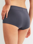Women model is wearing Shorty regular cut made of Cotton in Grey, Unicoloured from the Elastic series by CALIDA, Back view