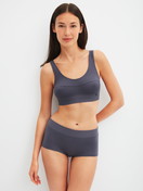 Women model is wearing Shorty regular cut made of Cotton in Grey, Unicoloured from the Elastic series by CALIDA, Outfit