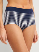 Women model is wearing Shorty regular cut made of Cotton in Blue, Striped from the Elastic Special series by CALIDA, Front view