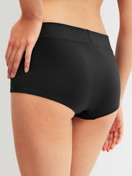 Le mannequin Femme porte le/la Panty taille haute en Coton de couleur Noir, Unicolore, de la série Elastic Special de CALIDA, Vue arrière