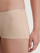 Women model is wearing Shorty regular cut made of Polyamide in Beige, Unicoloured from the Sleek Skin series by CALIDA, Detail
