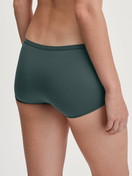 Le mannequin Femme porte le/la Panty taille haute en Polyamide de couleur Vert, Unicolore, de la série Sleek Skin de CALIDA, Vue arrière