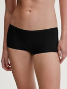 Women model is wearing Shorty regular cut made of Polyamide in Black, Unicoloured from the Sleek Skin series by CALIDA, Front view