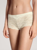 Women model is wearing Shorty regular cut made of Viscose in White, Lace from the Sensual Secrets series by CALIDA, Front view
