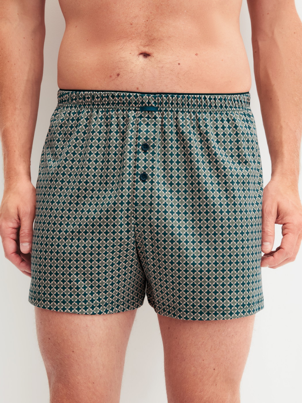 Men model is wearing Boxer shorts made of 100% Cotton in Beige, Patterned from the Cotton Choice series by CALIDA, Front view