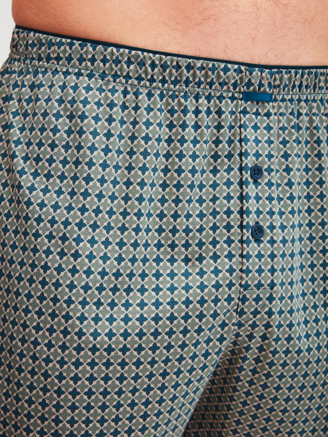 Men model is wearing Boxer shorts made of 100% Cotton in Beige, Patterned from the Cotton Choice series by CALIDA, Detail