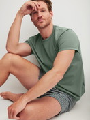 Men model is wearing Boxer shorts made of 100% Cotton in Beige, Patterned from the Cotton Choice series by CALIDA, Additional Image