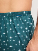 Men model is wearing Boxer shorts made of 100% Cotton in Turquoise, Patterned from the Prints series by CALIDA, Detail