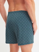Le mannequin Homme porte le/la Boxer short en Coton de couleur Bleu, À motifs, de la série Prints de CALIDA, Vue arrière