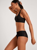 Women model is wearing Panty made of Modal in Black, Lace from the Natural Skin Lace series by CALIDA, Outfit