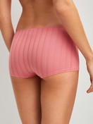 Women model is wearing High Waist Panty made of Cotton in Pink, Unicoloured from the Etude Xtra series by CALIDA, Back view
