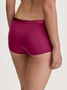 Women model is wearing Shorty regular cut made of Cotton in Pink, Unicoloured from the Cate series by CALIDA, Back view