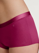 Women model is wearing Shorty regular cut made of Cotton in Pink, Unicoloured from the Cate series by CALIDA, Detail
