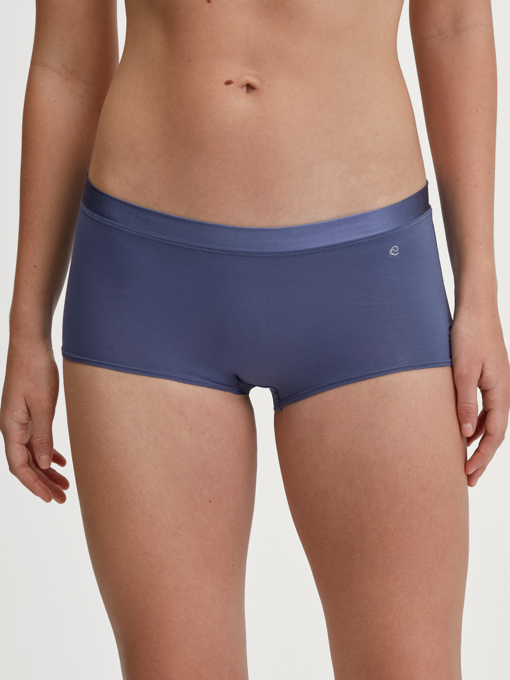 Women model is wearing Shorty regular cut made of Cotton in Blue, Unicoloured from the Cate series by CALIDA, Front view