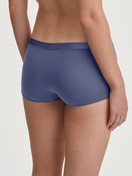 Women model is wearing Shorty regular cut made of Cotton in Blue, Unicoloured from the Cate series by CALIDA, Back view