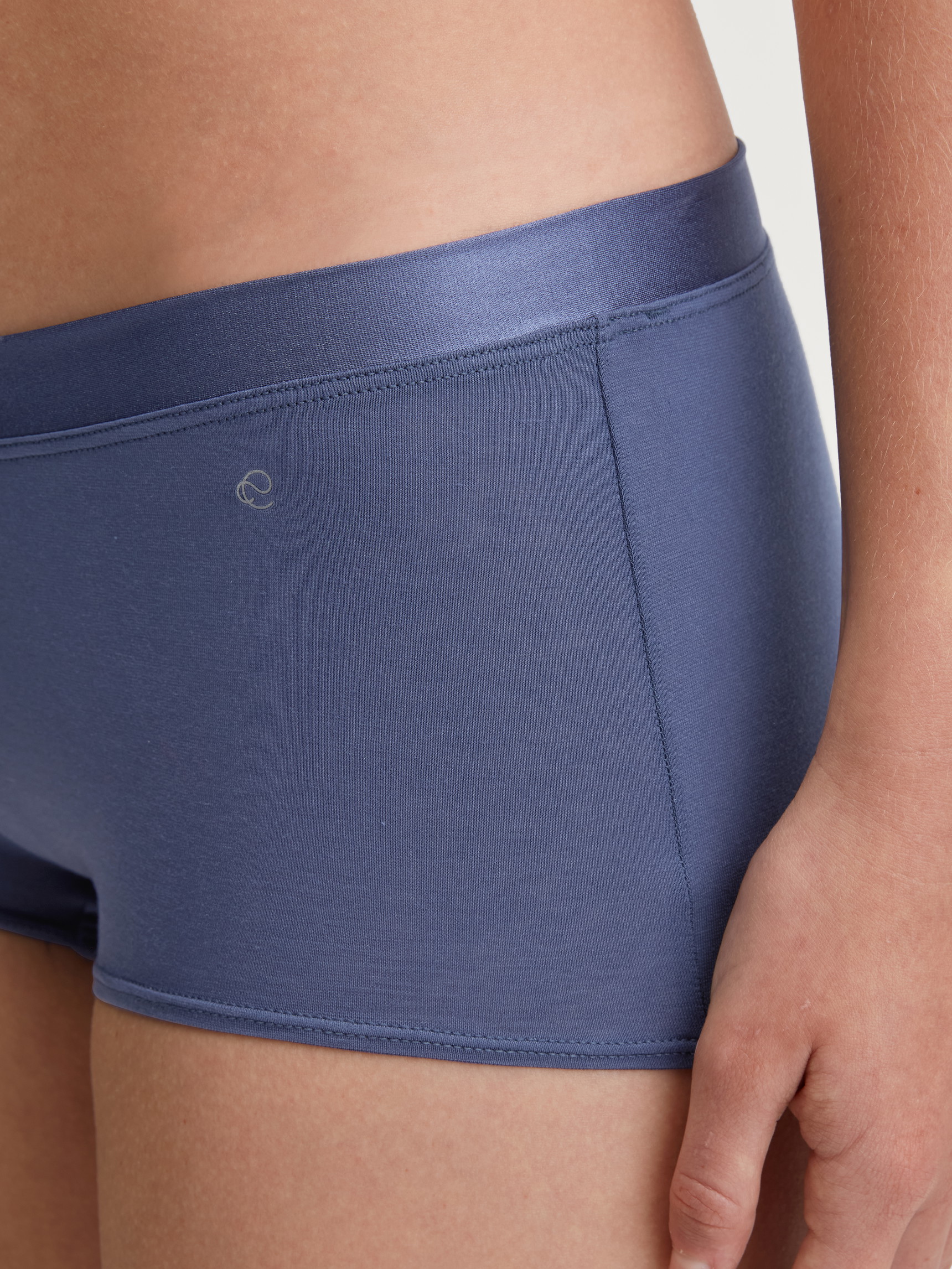 Women model is wearing Shorty regular cut made of Cotton in Blue, Unicoloured from the Cate series by CALIDA, Front view