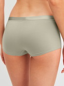 Women model is wearing Shorty regular cut made of Cotton in Green, Unicoloured from the Cate series by CALIDA, Back view