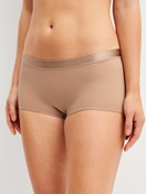 Women model is wearing Shorty regular cut made of Cotton in Beige, Unicoloured from the Cate series by CALIDA, Front view