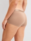 Women model is wearing Shorty regular cut made of Cotton in Beige, Unicoloured from the Cate series by CALIDA, Back view