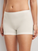Women model is wearing Shorty regular cut made of Modal in White, Unicoloured from the Seamless Natural series by CALIDA, Front view