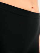 Women model is wearing Shorty regular cut made of Modal in Black, Unicoloured from the Seamless Natural series by CALIDA, Detail