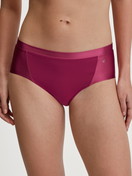 Women model is wearing Panty, low cut made of Cotton in Pink, Unicoloured from the Cate series by CALIDA, Front view
