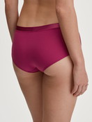 Women model is wearing Panty, low cut made of Cotton in Pink, Unicoloured from the Cate series by CALIDA, Back view