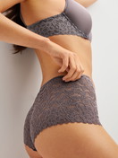 Women model is wearing Shorty regular cut made of Polyamide in Brown, Lace from the Natural Comfort Lace series by CALIDA, Additional Image