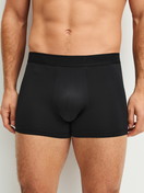 Men model is wearing Boxer brief made of Polyamide in Black, Unicoloured from the Micro Stretch series by CALIDA, Front view