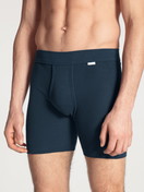 Men model is wearing Classic boxer brief with fly made of 100% Cotton in Blue, Unicoloured from the Cotton 1:1 series by CALIDA, Front view