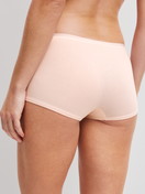 Damen-Model trägt Panty, regular cut aus Baumwolle in Rosa, Einfarbig aus Serie Natural Comfort von CALIDA, Rückansicht