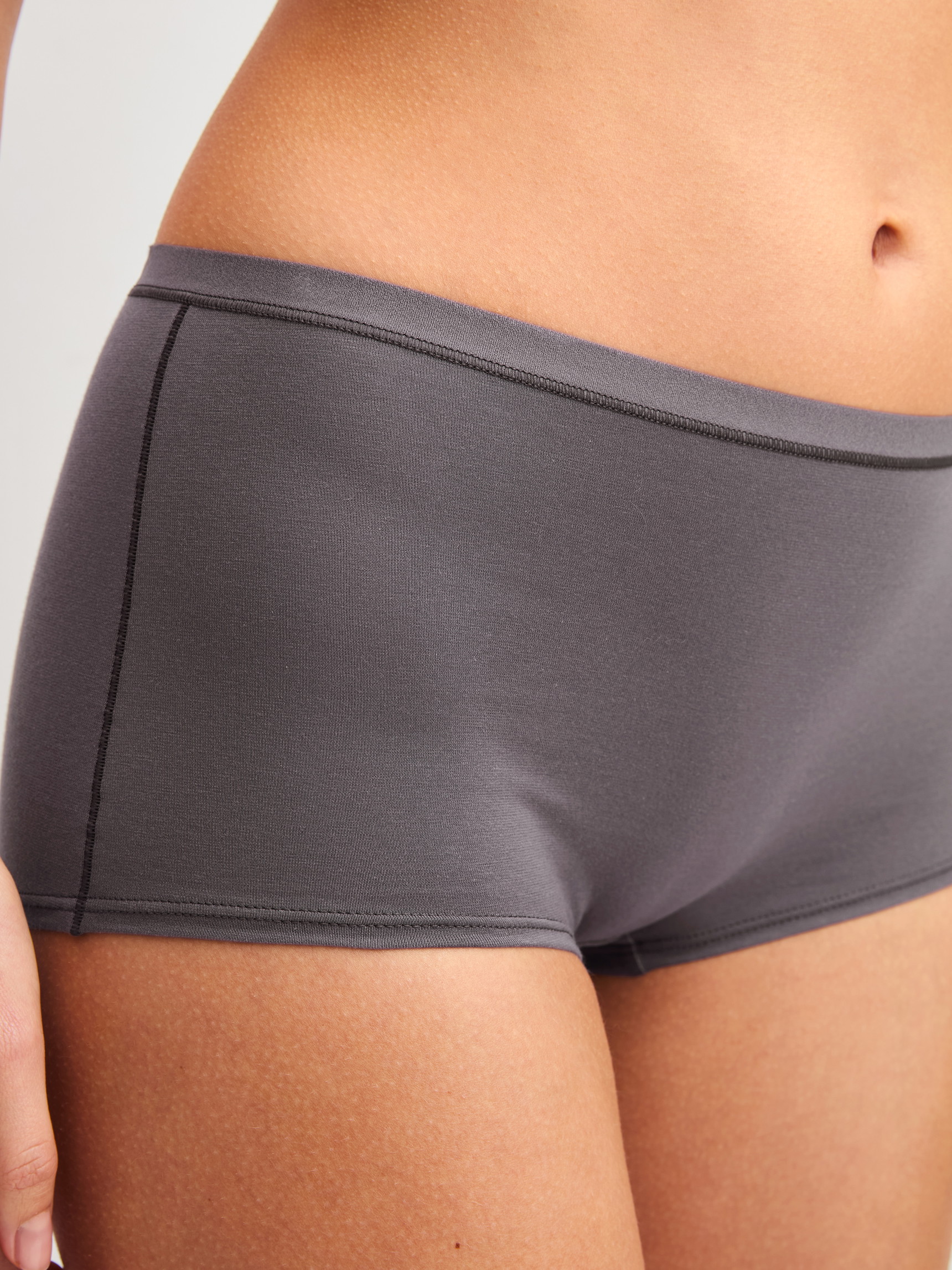 Women model is wearing Shorty regular cut made of Cotton in Brown, Unicoloured from the Natural Comfort series by CALIDA, Front view