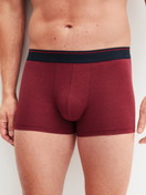 Men model is wearing Boxer brief made of Cotton in Red, Unicoloured from the Cotton Stretch series by CALIDA, Front view