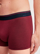 Men model is wearing Boxer brief made of Cotton in Red, Unicoloured from the Cotton Stretch series by CALIDA, Detail
