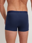 Herren-Model trägt Boxer Brief aus Lyocell in Blau, Einfarbig aus Serie Natural Cooling von CALIDA, Rückansicht