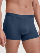Men model is wearing Boxer brief made of Cotton in Blue, Unicoloured from the Evolution series by CALIDA, Front view