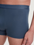Men model is wearing Boxer brief made of Cotton in Blue, Unicoloured from the Evolution series by CALIDA, Detail