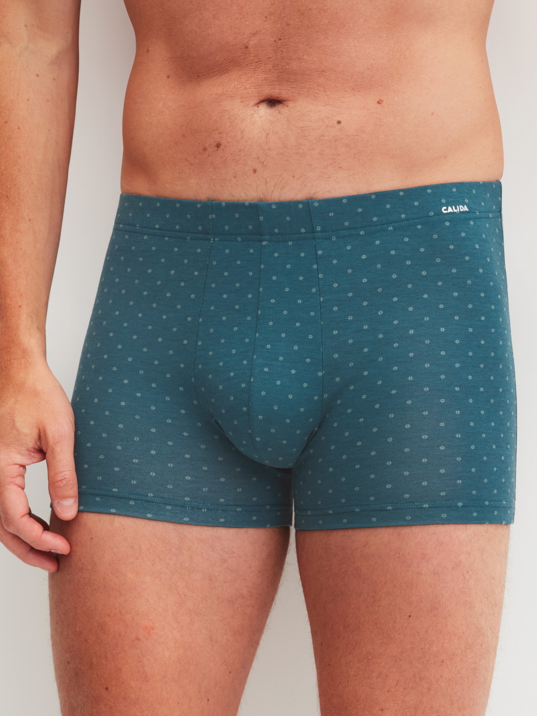 Men model is wearing Boxer brief made of Cotton in Blue, Patterned from the Cotton Code Design series by CALIDA, Front view
