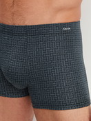 Men model is wearing Boxer brief made of Cotton in Black, Patterned from the Cotton Code Design series by CALIDA, Detail