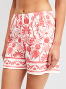 Women model is wearing Pyjama shorts made of 100% Cotton in Orange, Floral from the Favourites Beach series by CALIDA, Front view