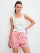 Women model is wearing Pyjama shorts made of Cotton in Orange, Striped from the Favourites Beach series by CALIDA, Outfit