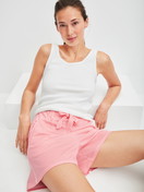 Women model is wearing Pyjama shorts made of Cotton in Orange, Striped from the Favourites Beach series by CALIDA, Additional Image