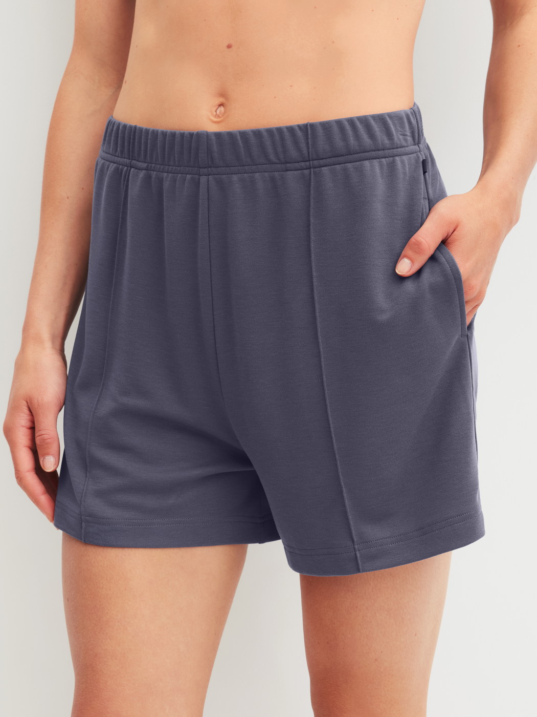 Women model is wearing Loungeshorts made of Modal in Blue, Unicoloured from the Natural Loungewear series by CALIDA, Front view